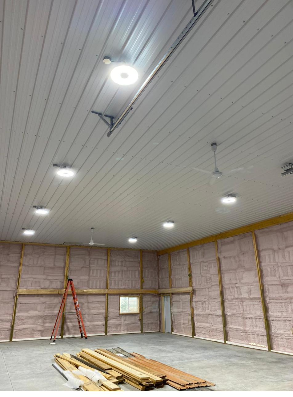 New shop build with completed lighting and ceiling fans